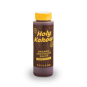 A bottle of Holy Kakow organic chocolate sauce sweetened with agave syrup